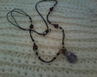 Beaded necklace with amethyst pendant