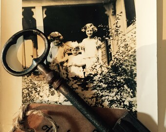 Vintage key cast iron, old key.
