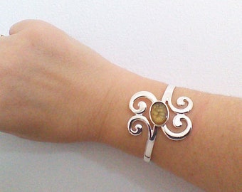 Bangle is modern, bouquet of spirals, light collection,