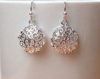 Round silver filigree earrings