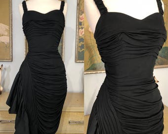 1960s Curvaceous Little Black Dress by Marie Norman Boutique -- Curve Hugging Silhouette with Dramatic Hip Swag!