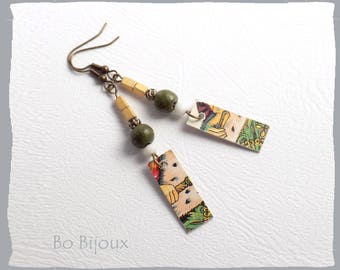 Earrings made from an ancient game of tarot.