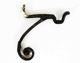Antique Cast Iron Plant Wall Hook. Circa 1890's - 1910's.