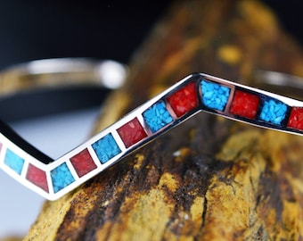 Sterling Silver skewed cuff bracelet w/ inlaid Kingman Turquoise and Red Coral