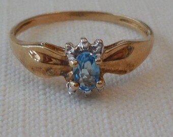 Blue Topaz ring with possible diamonds - Size 6 3/4