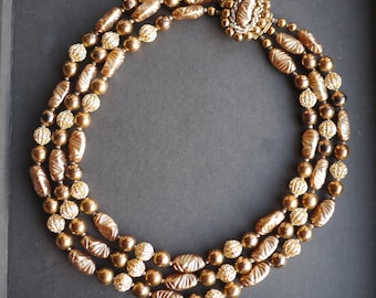 Gorgeous golden brown triple stranded beaded necklace 1950s