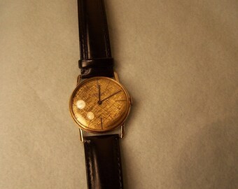Vintage Men's Gruen 18K Gold Watch with leather band