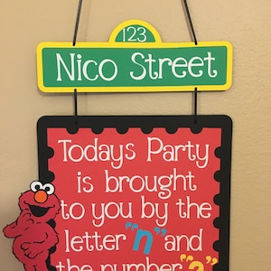 Elmo Birthday party door sign, Today's Party is brought to you by the letter "N" and the number "3"