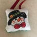 Snowman with black hat ornament