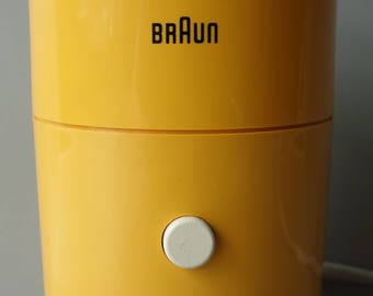 Iconic Braun coffee grinder designed by Reinhold Weiss Braun West Germany 1966 modern design ochre yellow mid century minimalism electronic