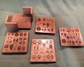 Wooden animal track drink coasters