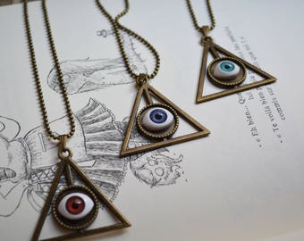 Triangle and eye cabochon pendant