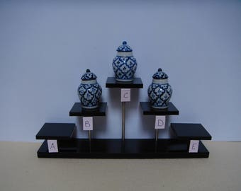 3 blue and white ginger jars.