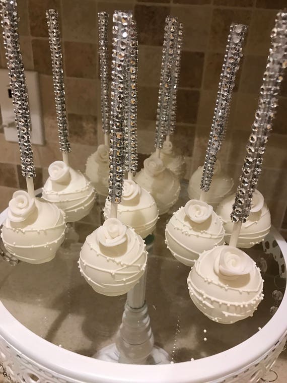 White Dipped and Drizzled Cake Pops with White Sprinkles and