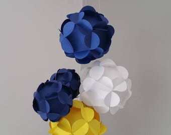 Suspension of five 3D paper balls.