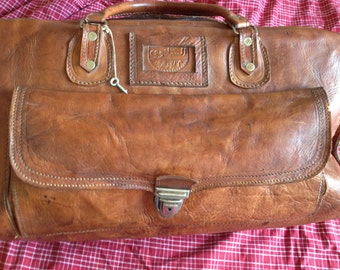 leather travel bag. leather travel bag vintage. Old travel bag.