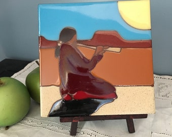 Mexican woman playing flute tile