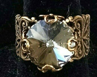 Filigree Antique Brass ring with Black Diamond Swarovski Crystal.