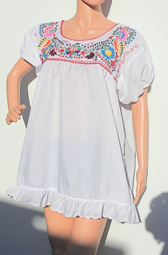 Mexican fiesta dress with flowers embroidery
