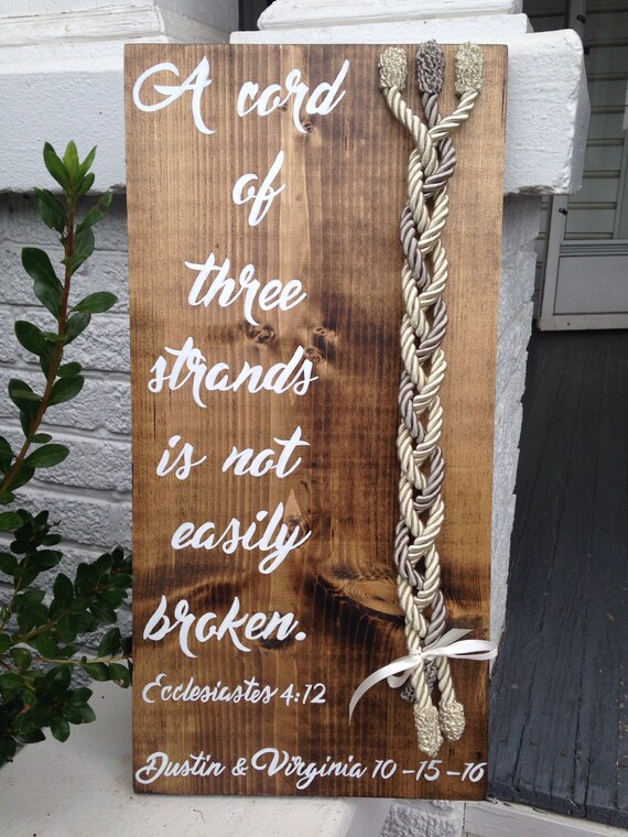 A cord of three strands is not easily broken wedding sign