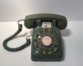 Vintage avocado green bell system rotary phone