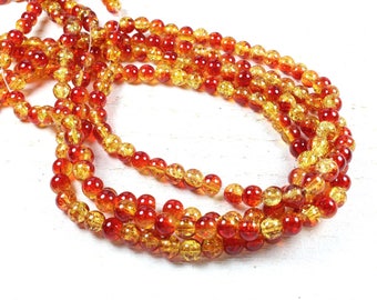 50 red & orange 6mm two-tone cracked glass beads