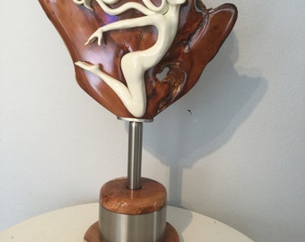 Porcelain sculpture . Two minds one heart