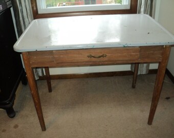 HOOSIER YOUR MAMA? Rustic Farmhouse Style Hoosier Table with White Porcelain Enamel Tabletop and pull out drawer that is missing its bottom