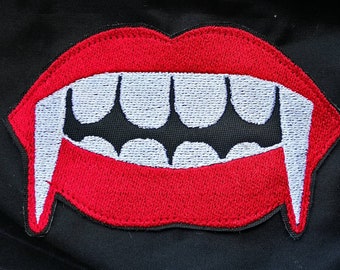Patch Teeth vampire fangs size 5x10 cm approx