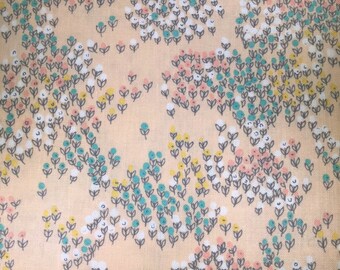 Beige cotton fabric with tiny flowers. Imogen by Alice Kennedy for Timeless Treasures. Imogen-C 3780
