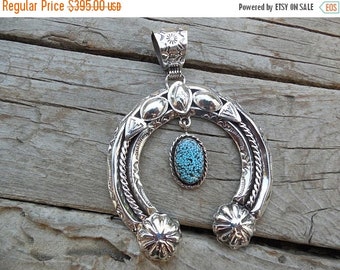 ON SALE Naja pendant handmade and signed in sterling silver, by a Navajo silversmith with Kingman spiderweb turquoise