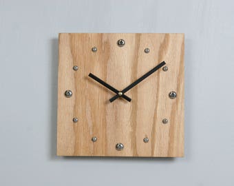 Oak Plywood clock with stainless steel hour markers and Tung oil finish. USPS priority shipping to USA included