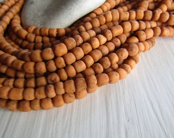 gritty orange glass seed bead, matte opaque barrel tube, small rustic ethnic spacer, indonesian 3 to 6mm new indo-pacific (22 inches)7ab29-7