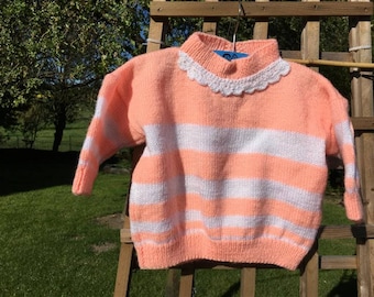 Baby 18 months with salmon and white stripes sweater