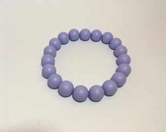 Semi precious beads bracelet, pastel blue/violet 10 mm shell