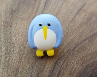 Bouton polyester fantaisie pingouin bleu