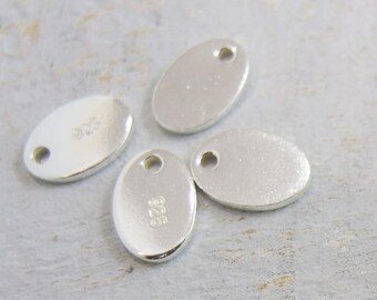 8 of 925 Sterling Silver Oval Disc Tag Charms 7x10 mm. :th2077