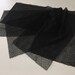 assortment of various smaller sheer lingerie tulle lace / mesh swatches — black (dots/geometric) — different sizes and patterns