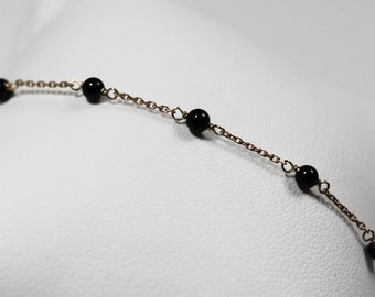 Rose gold and onyx beads