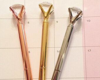 Pen with gem on top