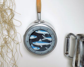 Object wall decoration sardines handpainted on old saucepan.