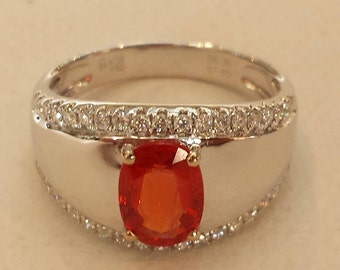 18 K white gold diamond and orange sapphire ring