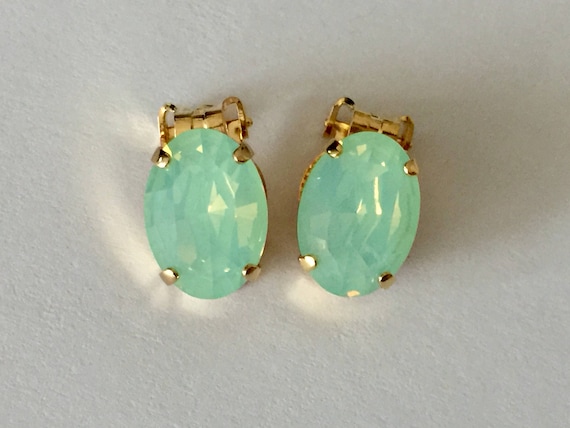 Oval Chrysolite Opal Swarovski Crystal Clip On Earrings, Yellow Gold