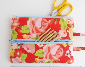 Double Zip Tool Bag | Red floral fabric pouch with two zippered compartments and a hanging loop.