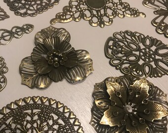30 metal embelishments , powertex, metal leaf ,metal filigree embellishments, scrapbook corners , mixed media, jewellery making, flowers art