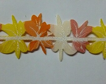 cut flowers, yellow, pink and orange Ribbon