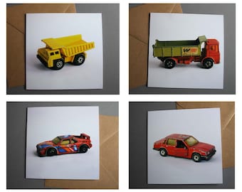 Set of four toy vehicle greetings cards