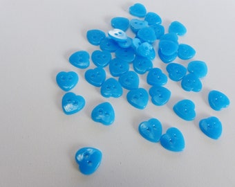 40 blue heart shaped buttons