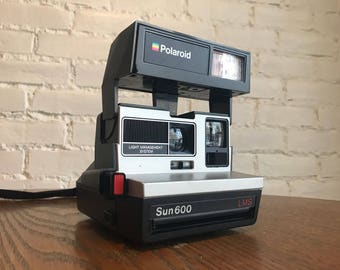 Working Polaroid Sun 600 LMS