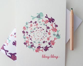 Postcard illustrated with a spiral of fish